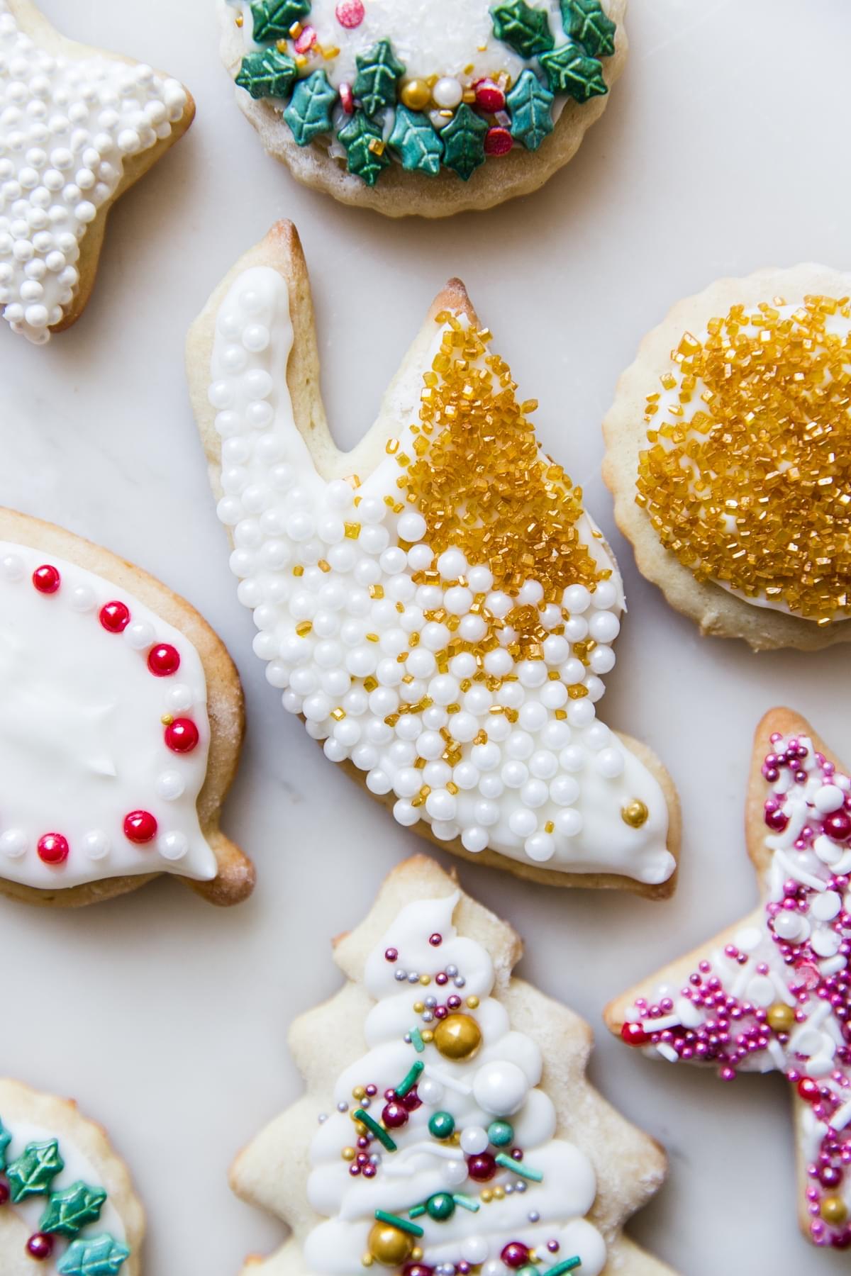 Sour Cream Sugar Cookies with Christmas sprinkles.