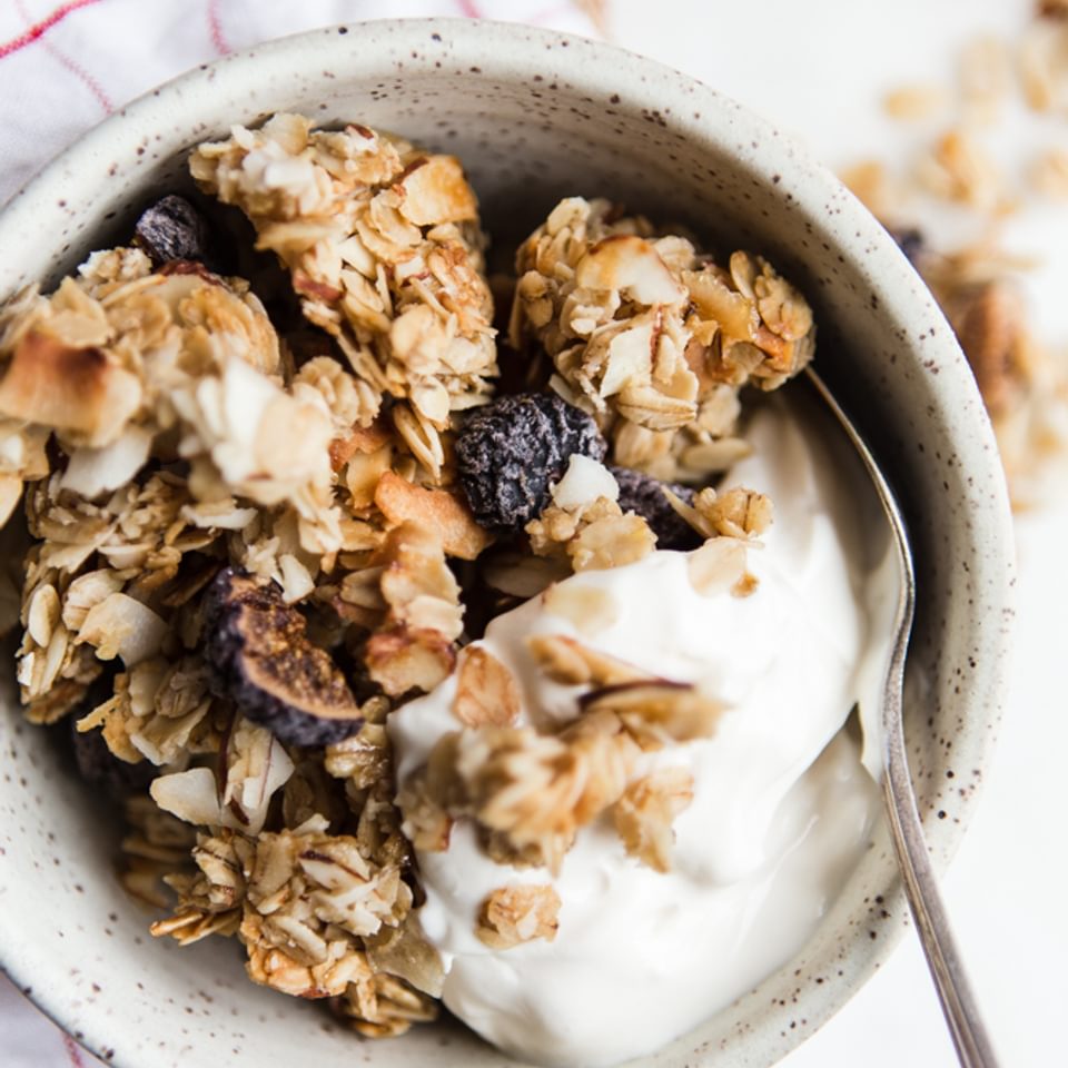 homemade vanilla Granola with Figs, Almonds and Coconut with yogurt