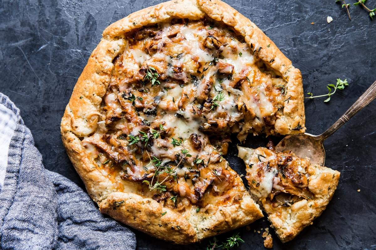 Wild Mushroom Galette With Herb Crust with a slice removed
