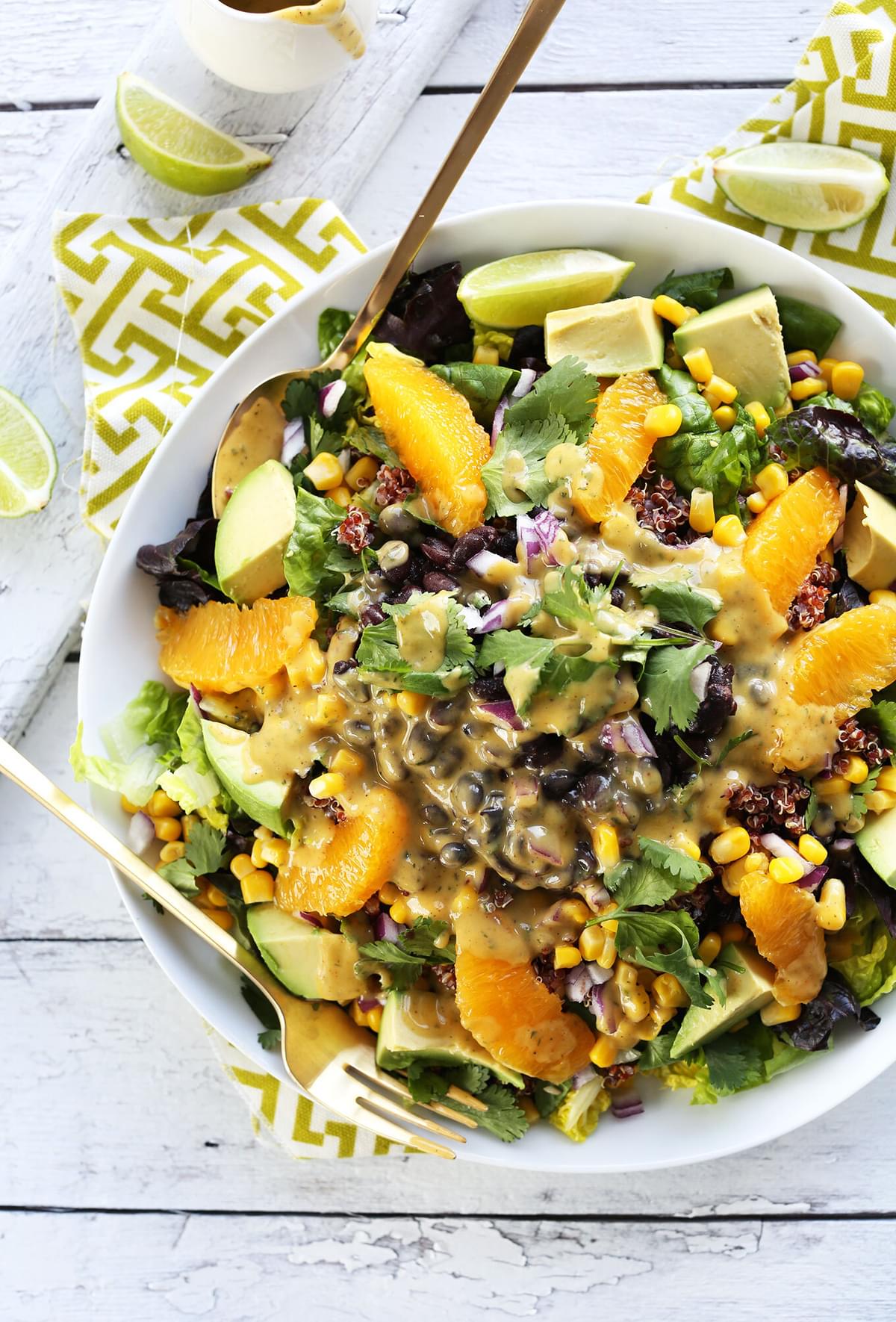 HEALTHY Vegan Mexican Quinoa Salad with Black Beans Corn Avocado and a Creamy Orange Chili Dressing vegan