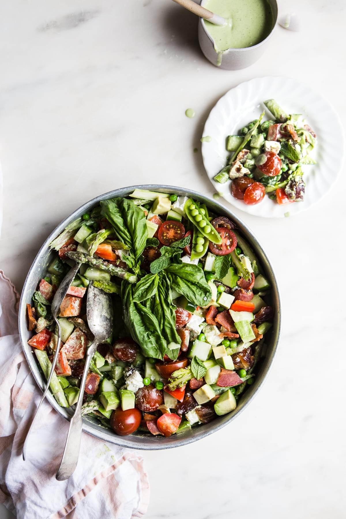 Spring Chop Salad With Asparagus And Peas tomatoes, feta dates and bacon green goddess yogurt dressing