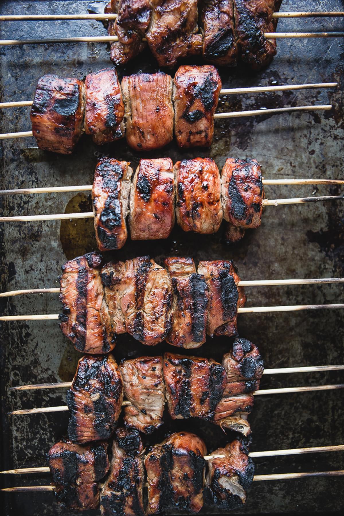 grilled Hoisin Marinated Pork Kababs  on a baking sheet