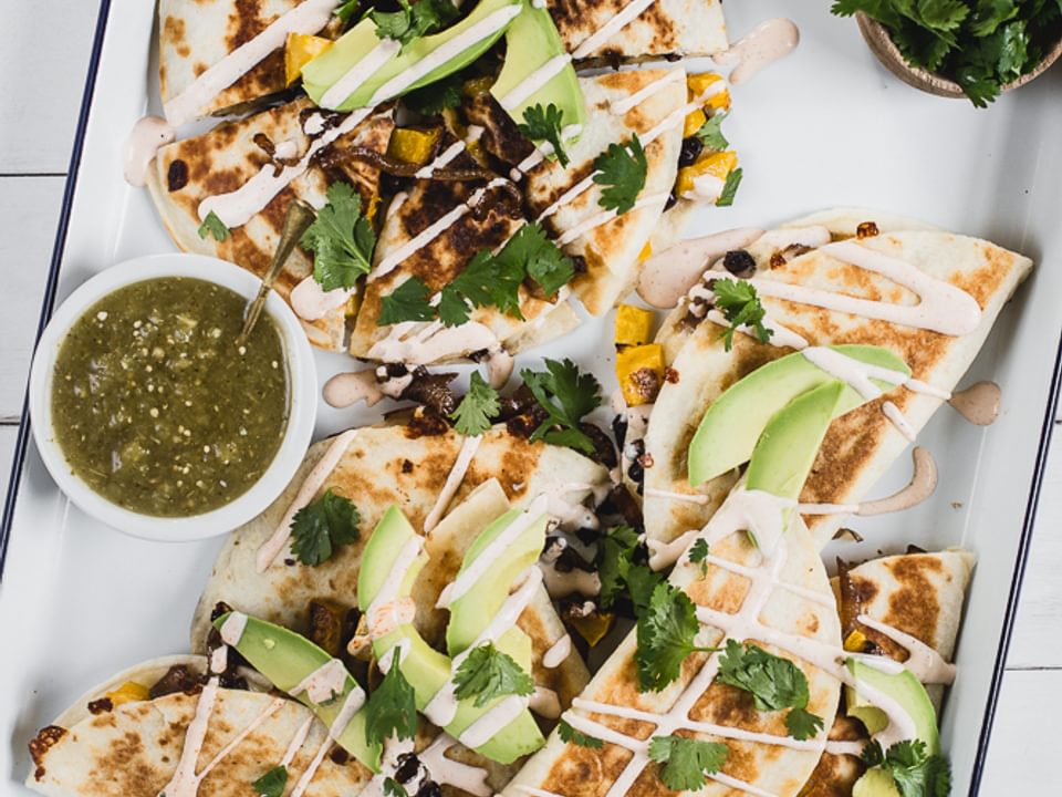 Butternut Squash Quesadilla with Caramelized Onion, black beans, avocado and chipotle crema