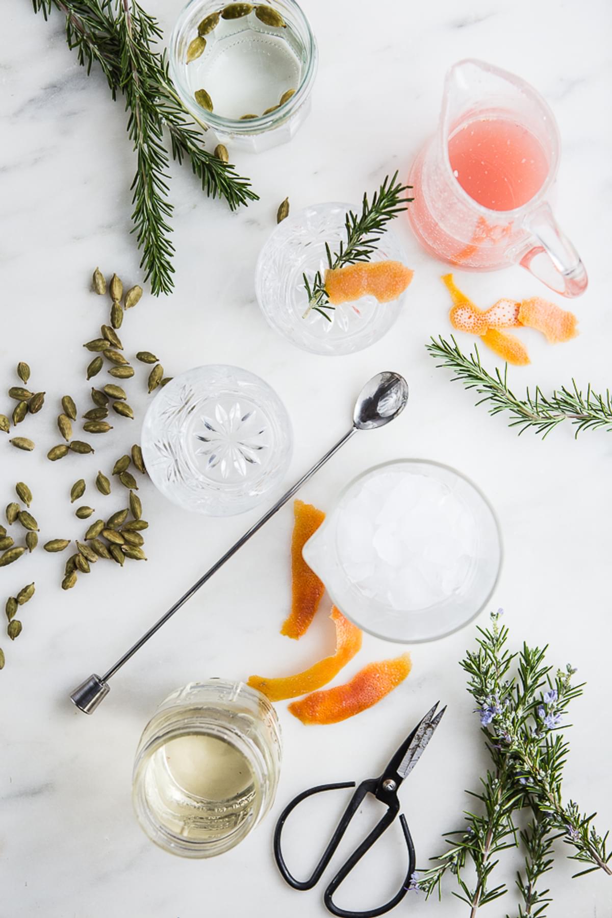 Grapefruits, Cardamom Gin and rosemary simple syrup cocktail