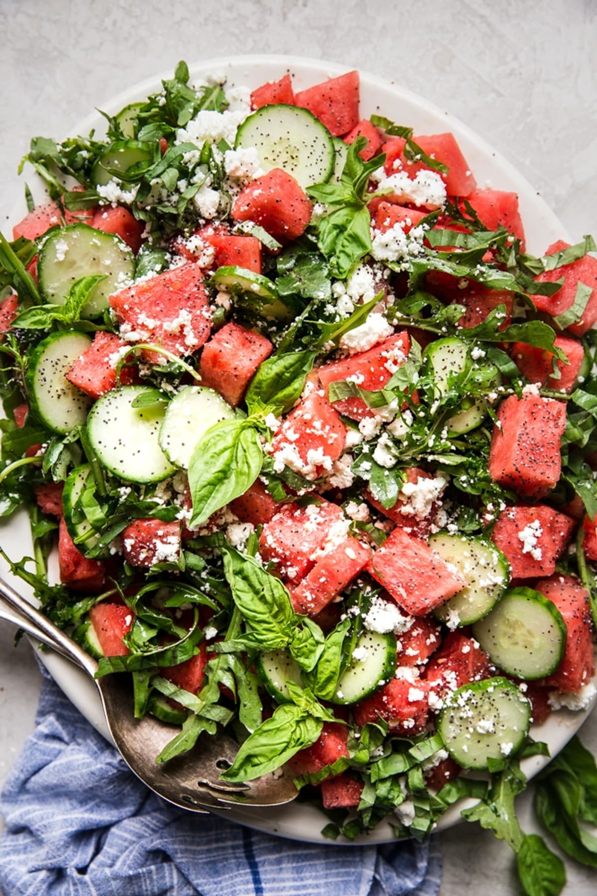 watermelon salad with cucumber, feta, and poppyseed dressing