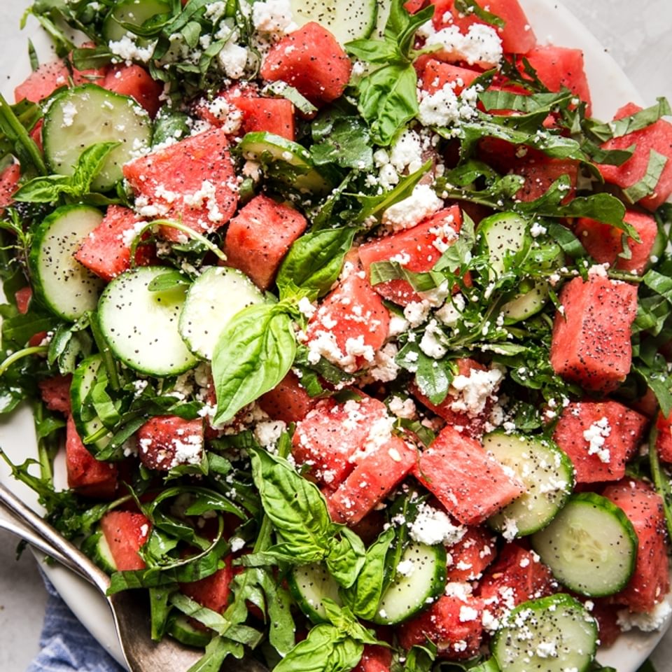 watermelon salad with cucumber, feta, and poppyseed dressing