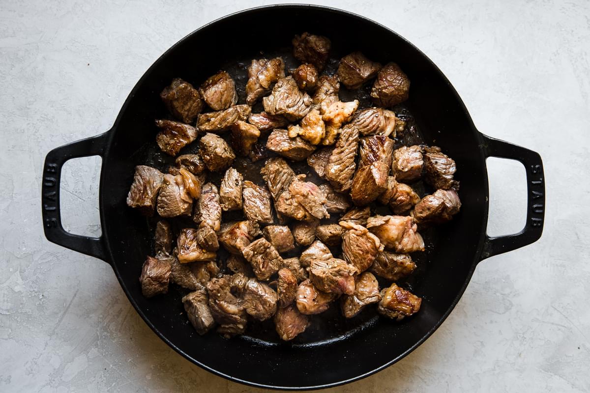 chuck roast cut into 1 inch pieces and browned in a cast iron pan