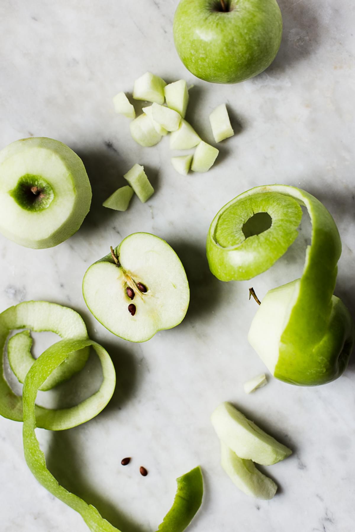 green granny smith apples cut in half and peeled