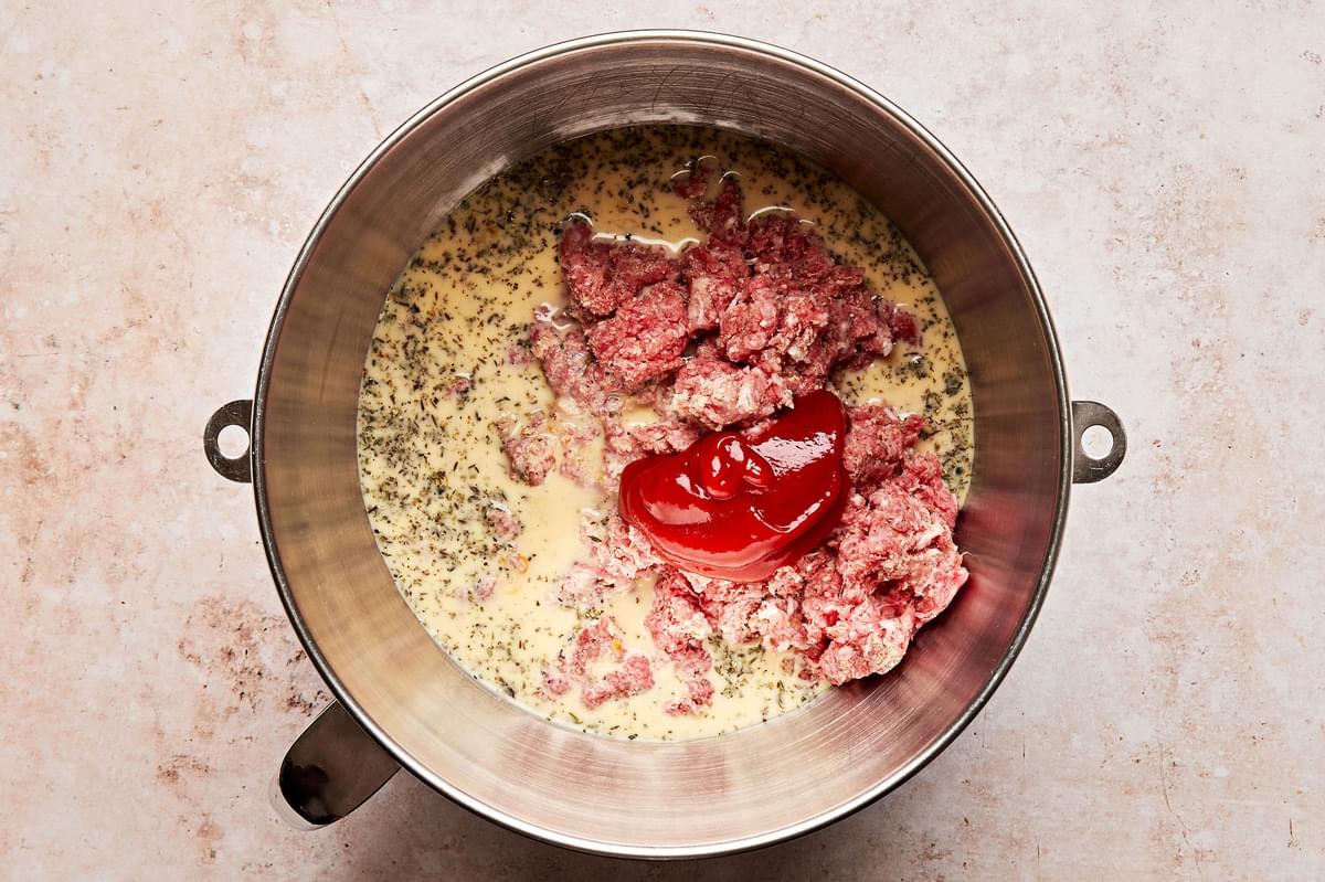ground beef, ground pork, breadcrumbs, ketchup egg, milk and spices in a large mixing bowl to make mini meatloaf