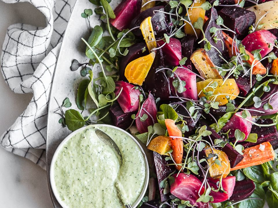 Roasted Beet Salad with Chèvre Green Goddess Dressing roasted carrots and micro greens