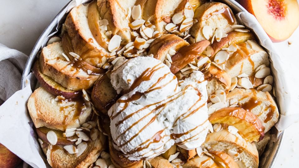 Almond Peach Bread Pudding with caramel and ice cream