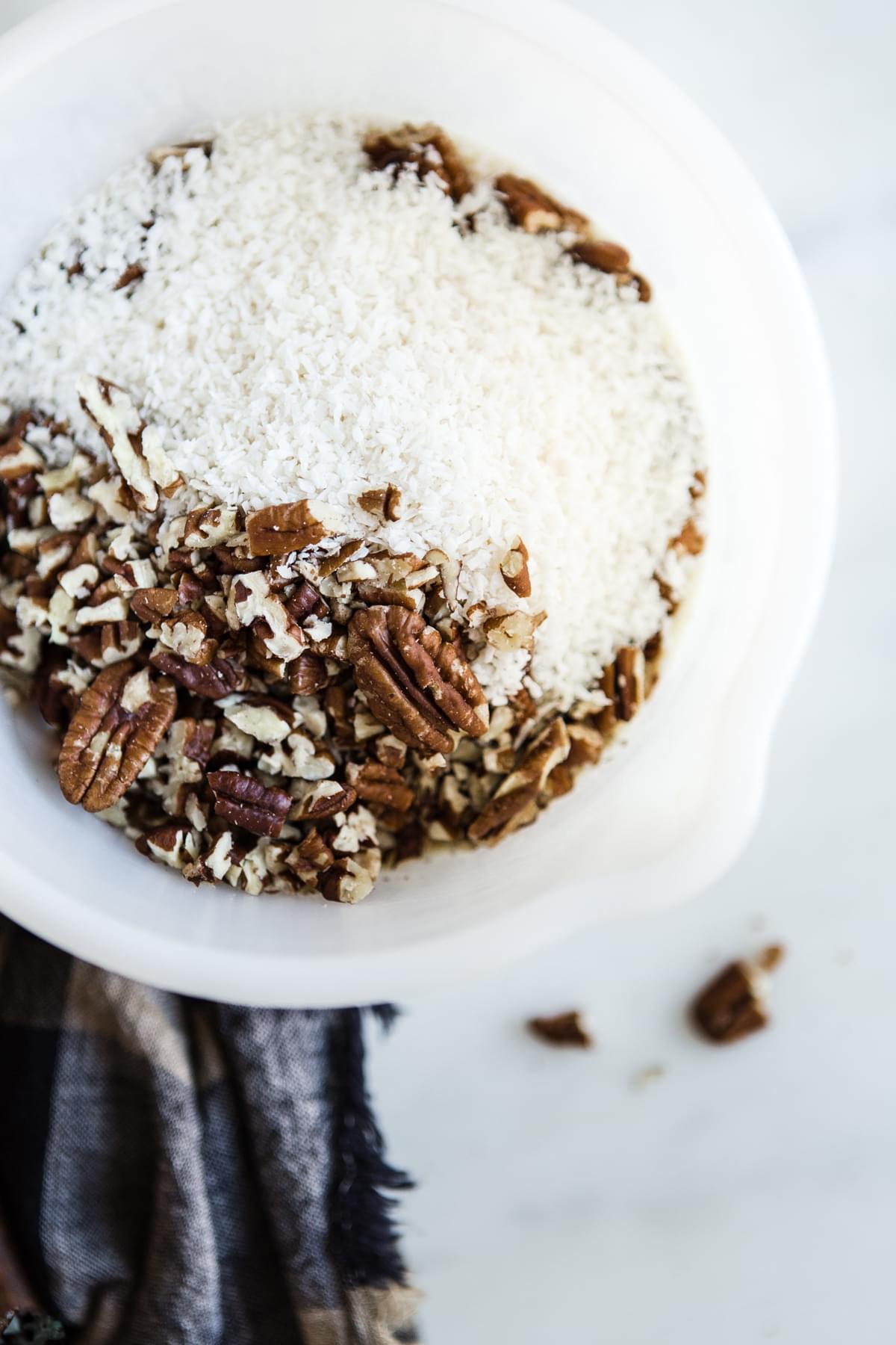 coconut and pecans in a bowl