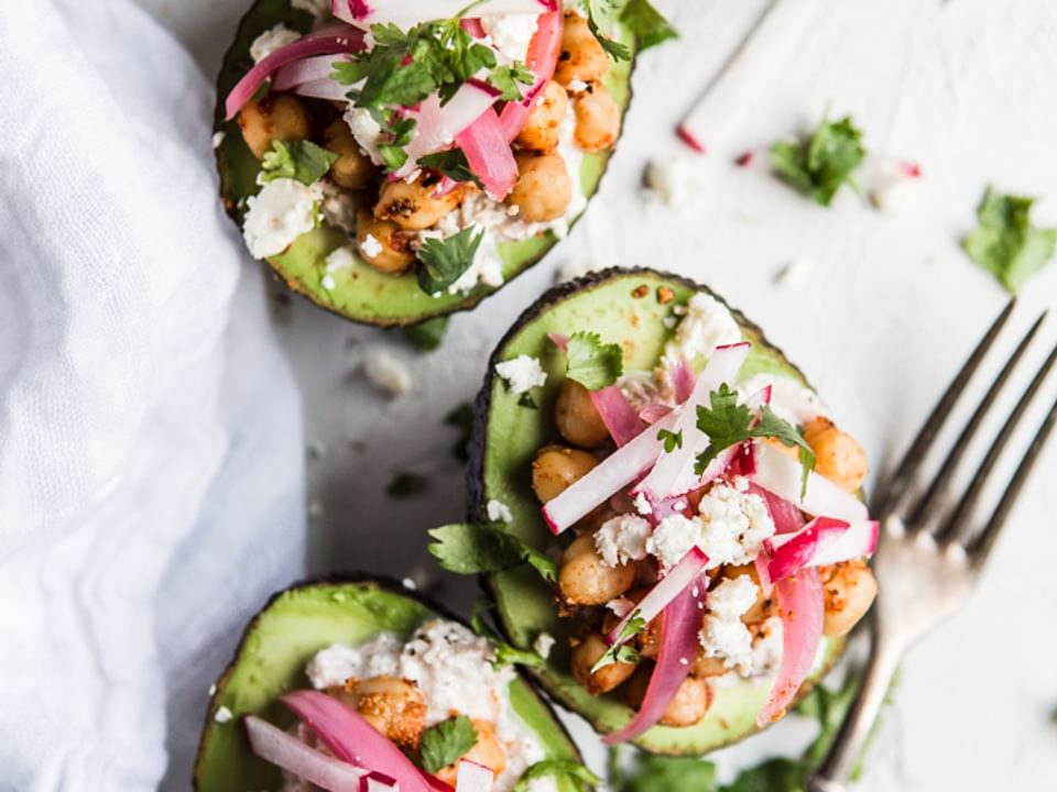 Tuna Salad And Chickpea Stuffed Avocado with pickled onions