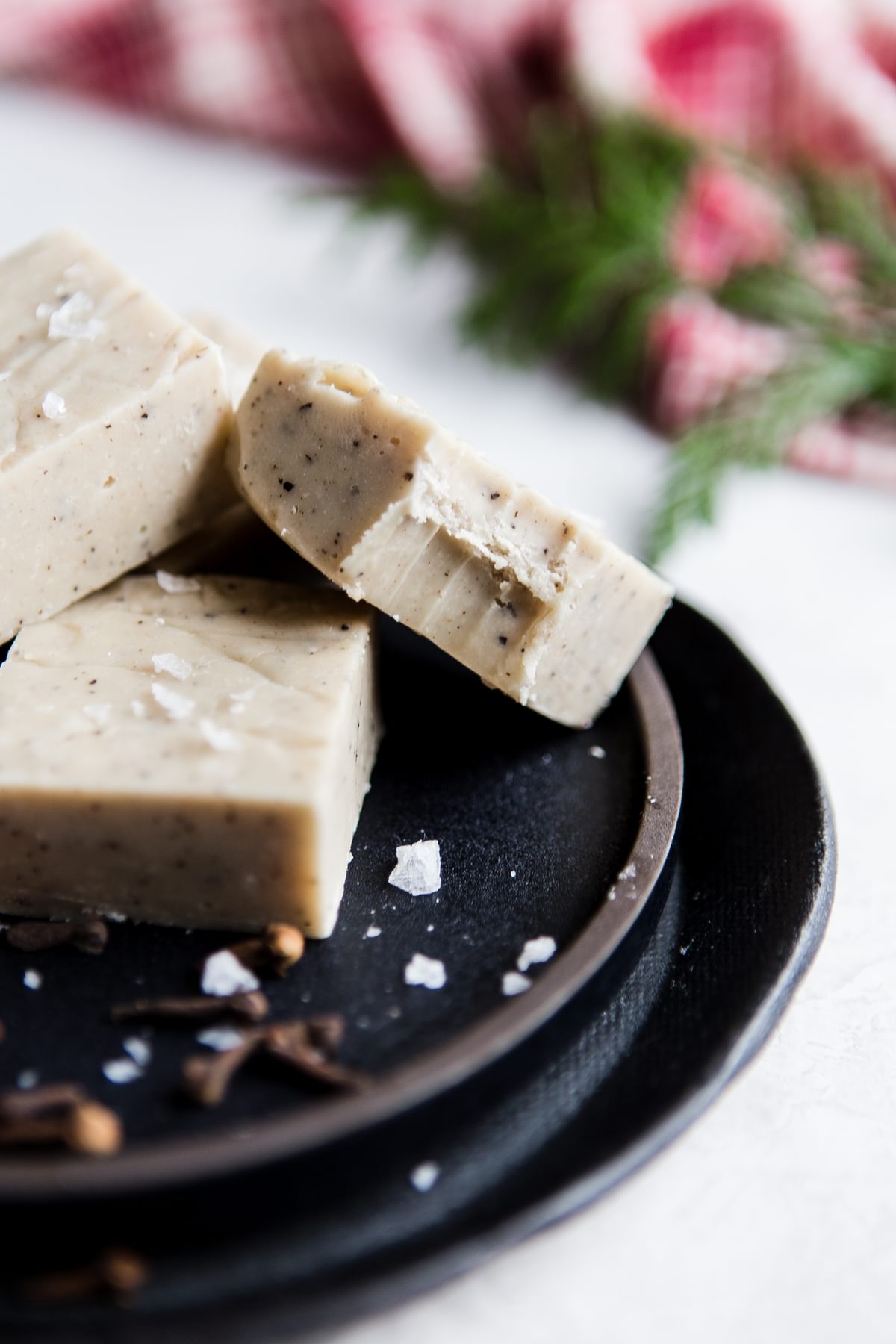 3 squares of white chocolate chai fudge on a plate