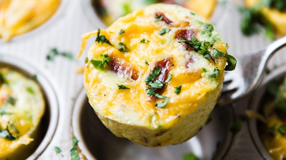 bacon cheddar egg muffins with jalapeño cheddar and cilantro