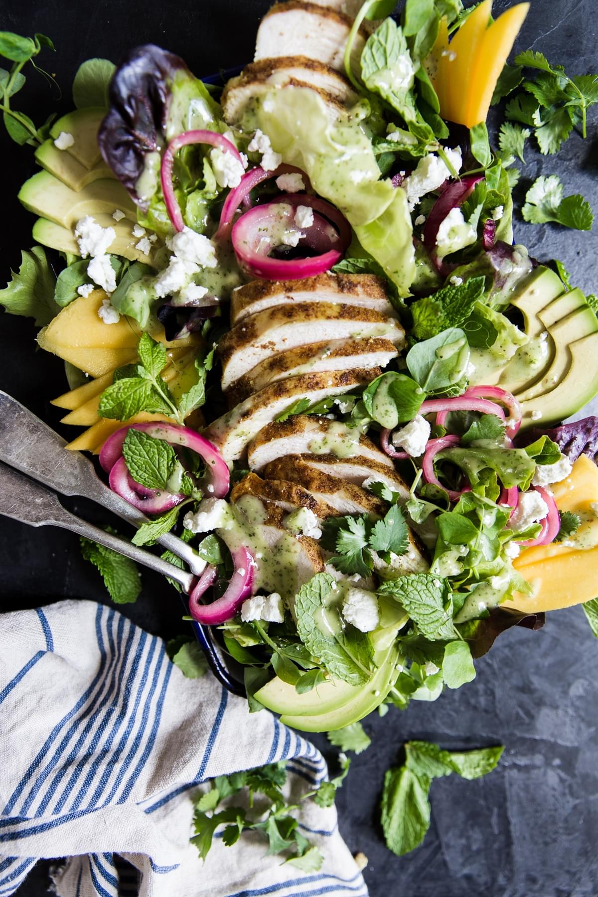Grilled Curry Chicken Salad With Mangos and pickled onions.