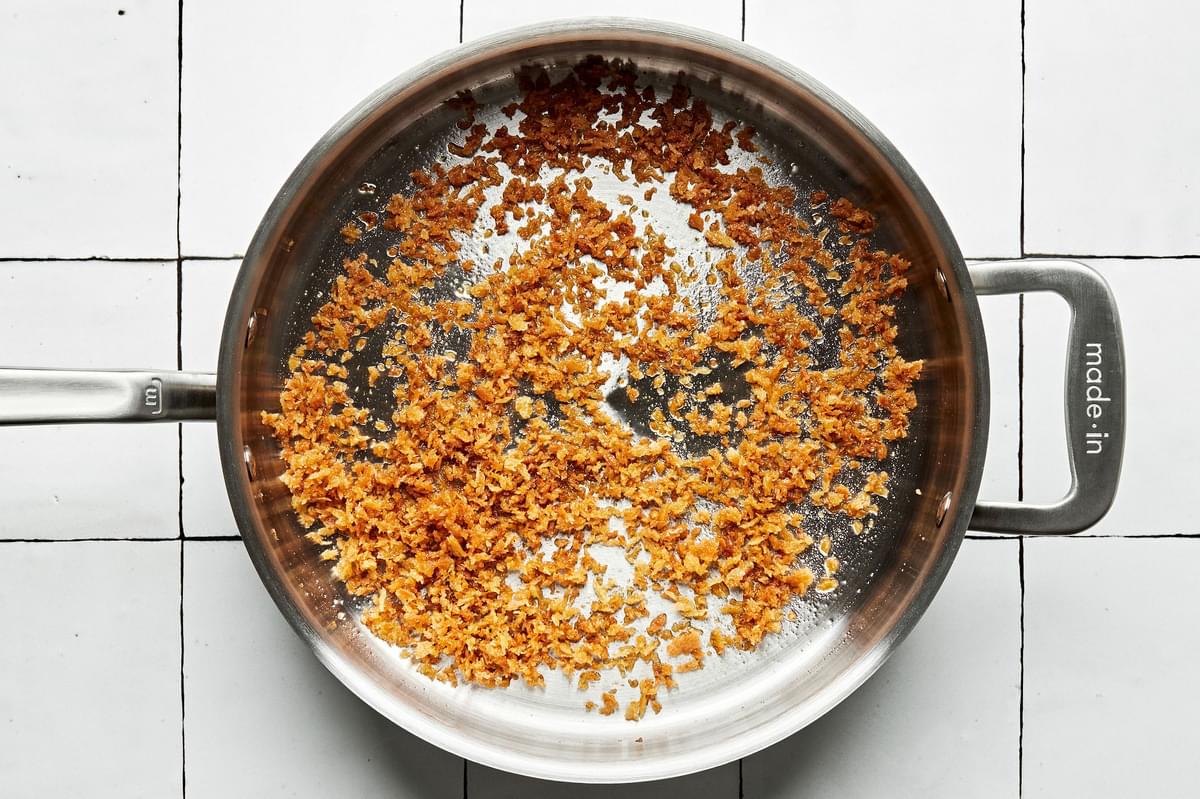 Olive oil toasted panko breadcrumbs in a skillet