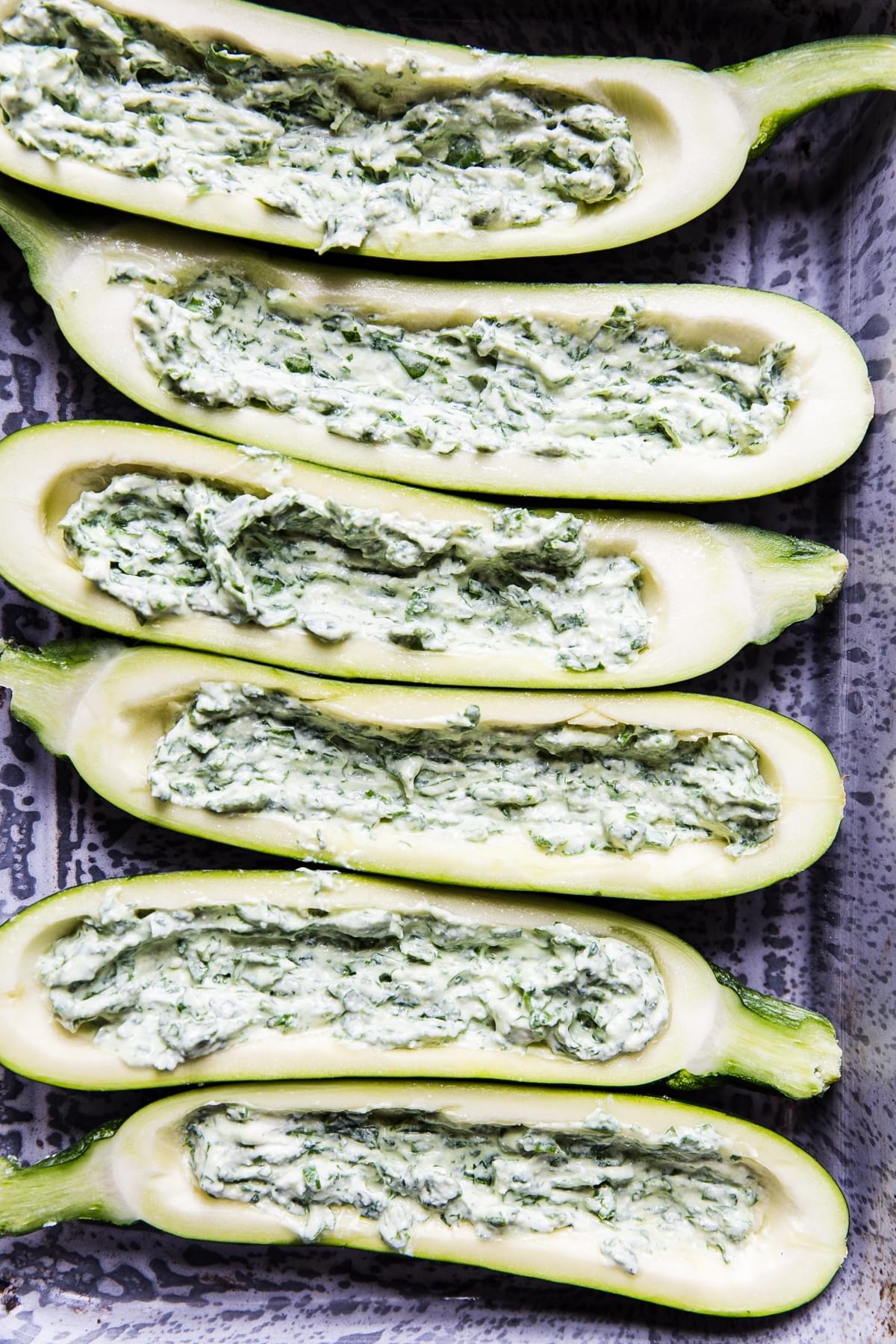 zucchini halved filled with ricotta and spinach