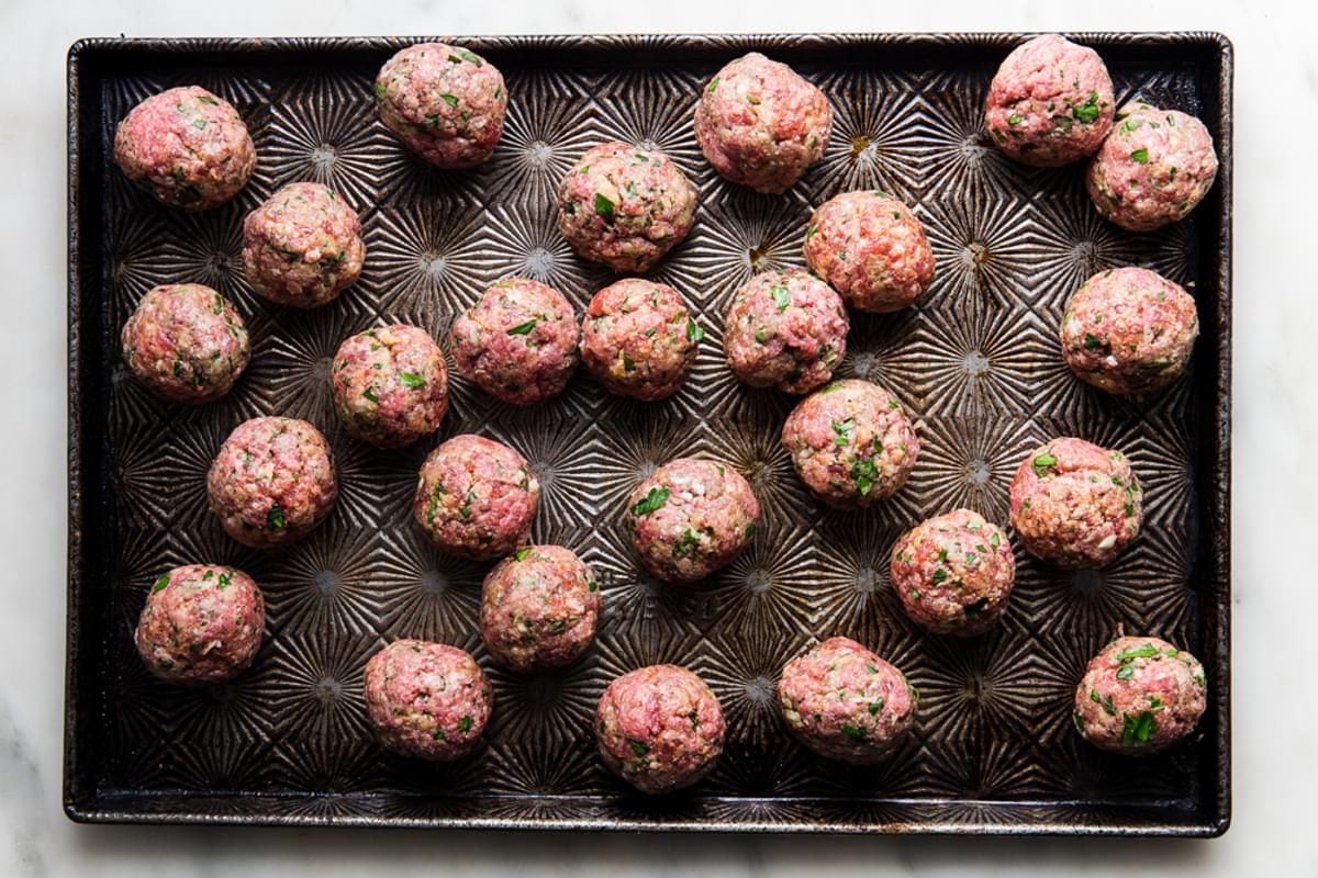 Italian meatballs on a baking sheet