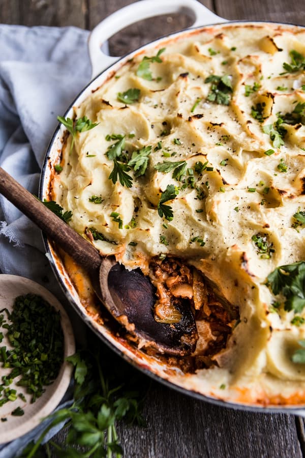 Paleo Shepherds Pie, whole 30 parsnip pie with a scoop taken out on a table
