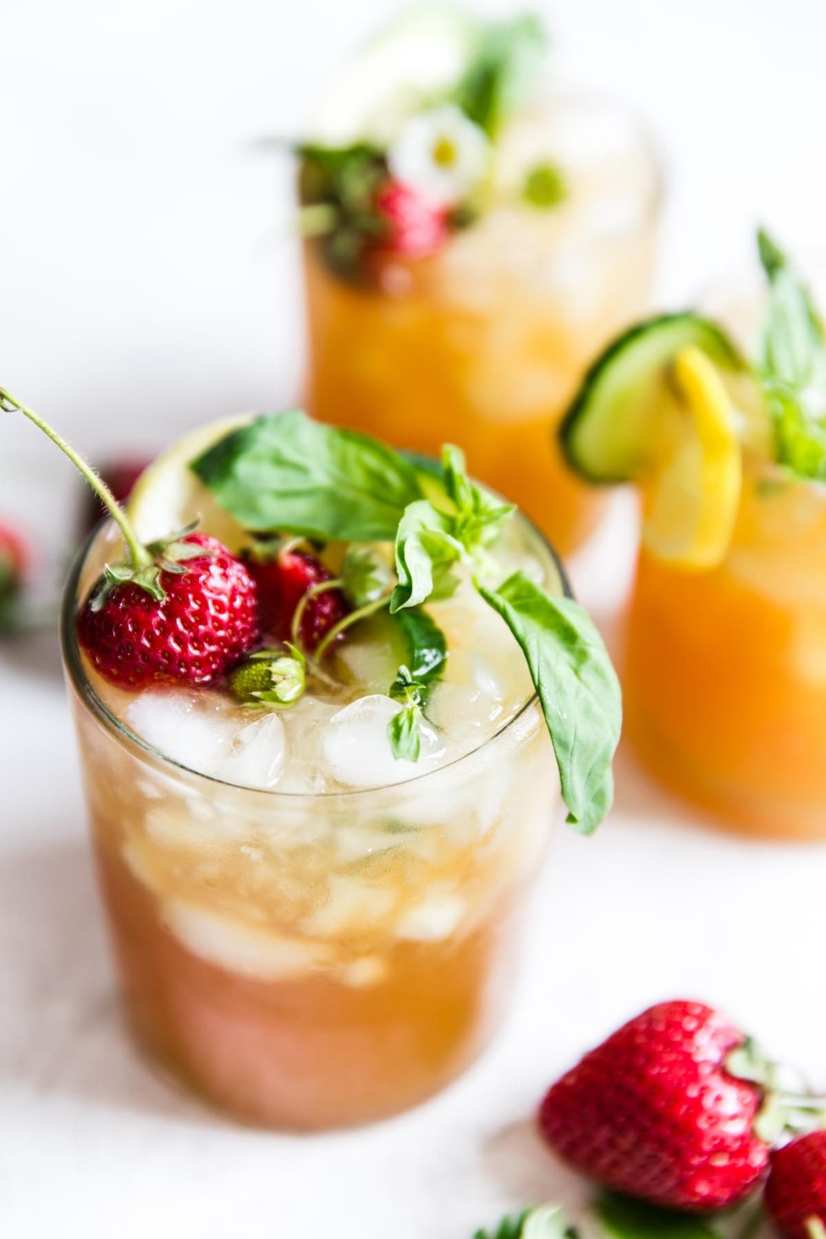 pimms cup with strawberries and basil