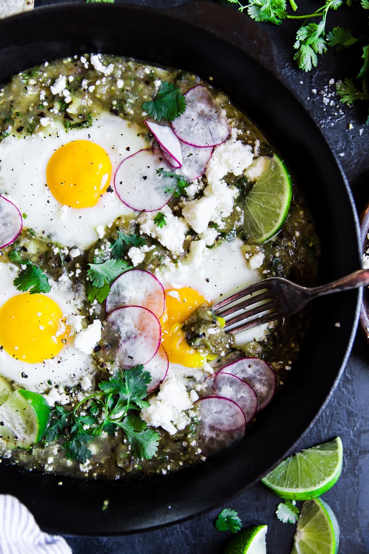 Salsa Verde Eggs with cilantro, cotija, radishes and lime