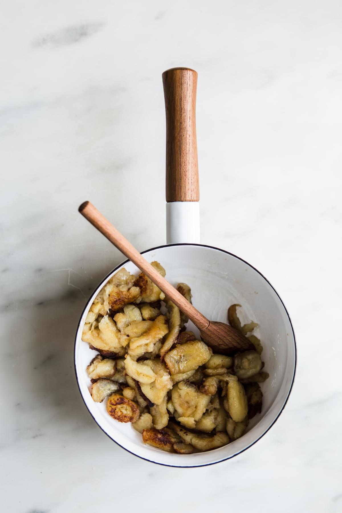 caramelized banana in a white pot