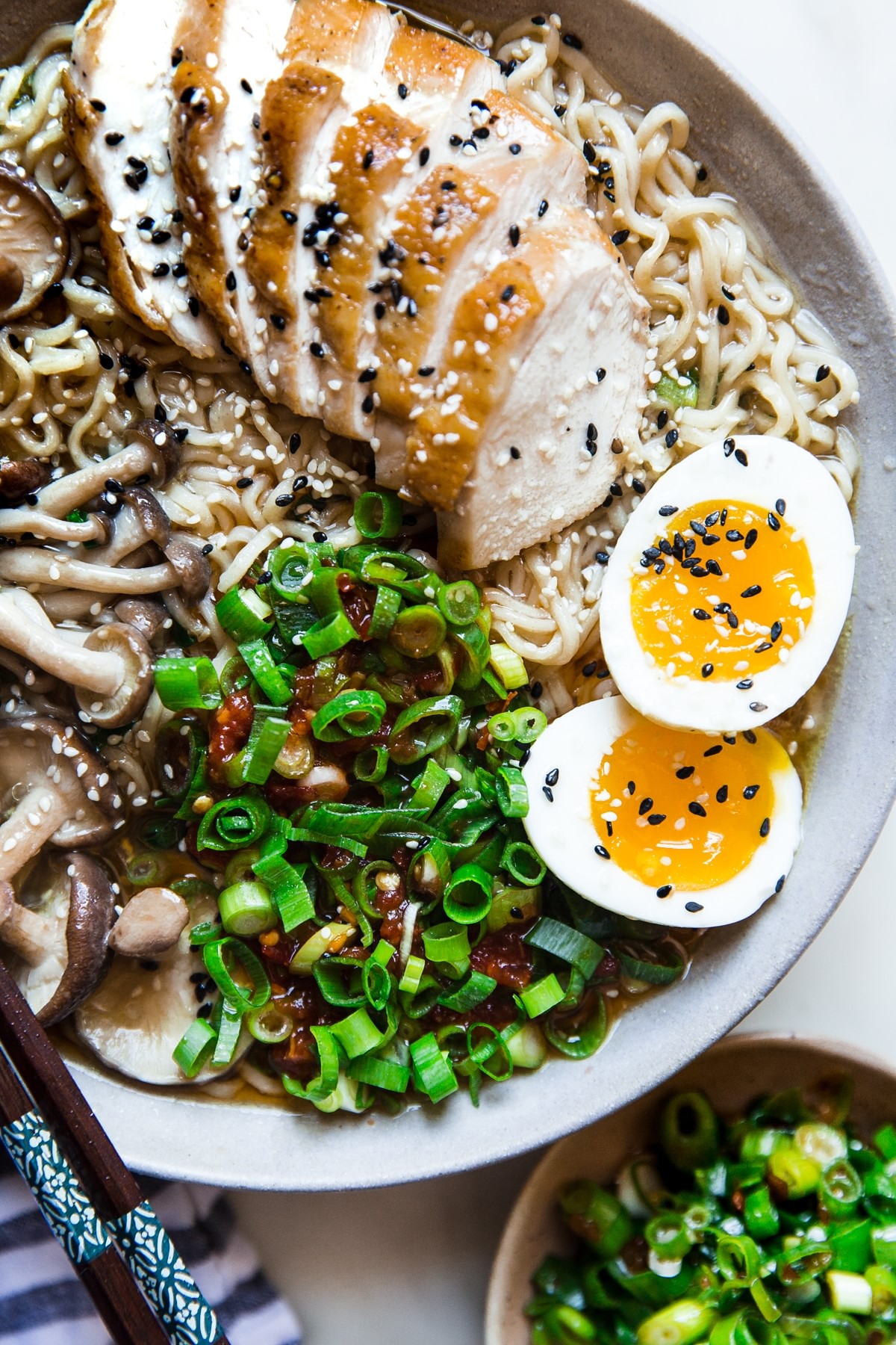 Easy Chicken Ramen Soup in a bowl with egg mushroom green onions