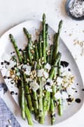 Grilled Asparagus With Balsamic Glaze, pine nuts, and parmesan cheese