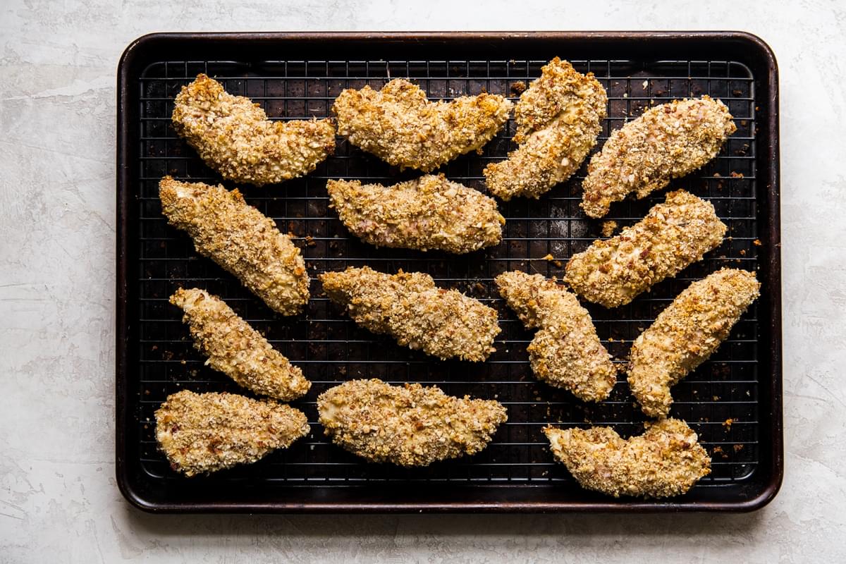 Baked chicken tenders recipe fresh out of the oven on a baking sheet