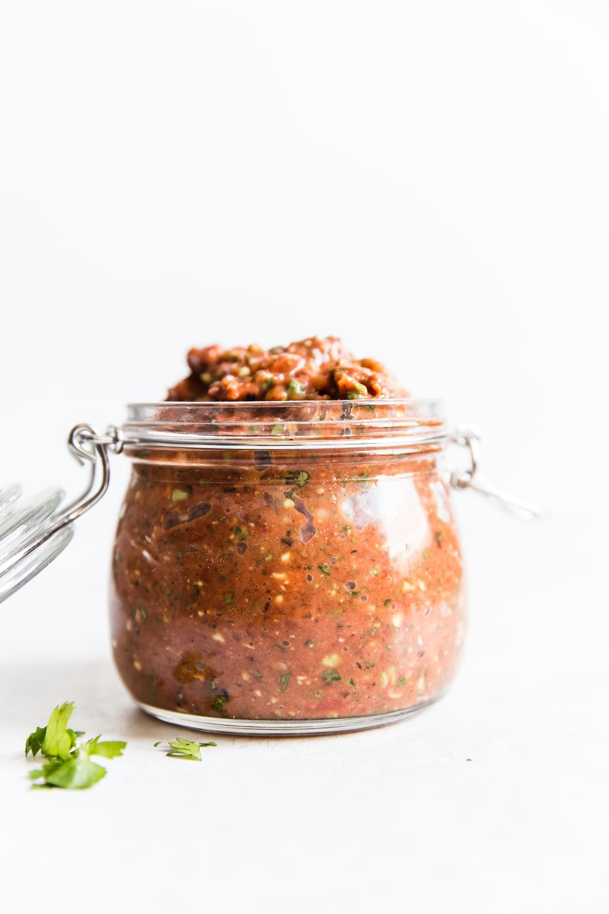 a jar of fresh tomato homemade restaurant style salsa
