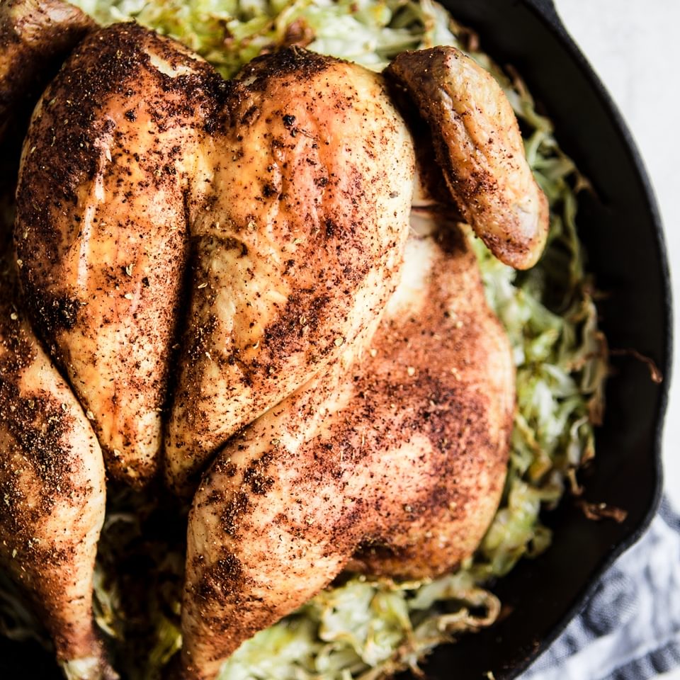 Roasted Chicken With taco seasoning over Cabbage in a skillet