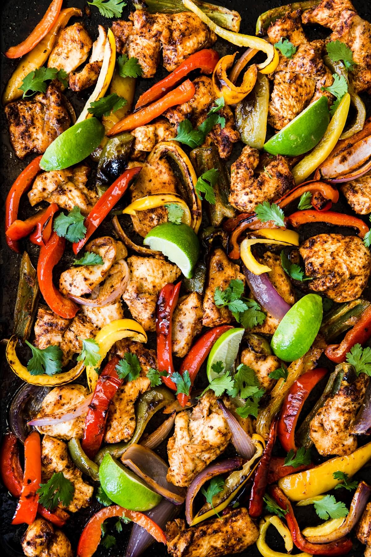 Sheet Pan Chicken Fajitas with lime juice, olive oil and taco seasoning.