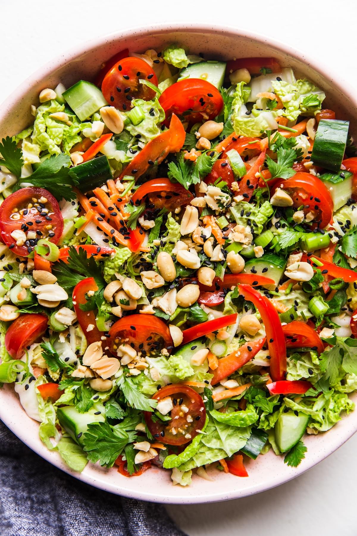 Asian chop salad with sesame seeds, red bell pepper