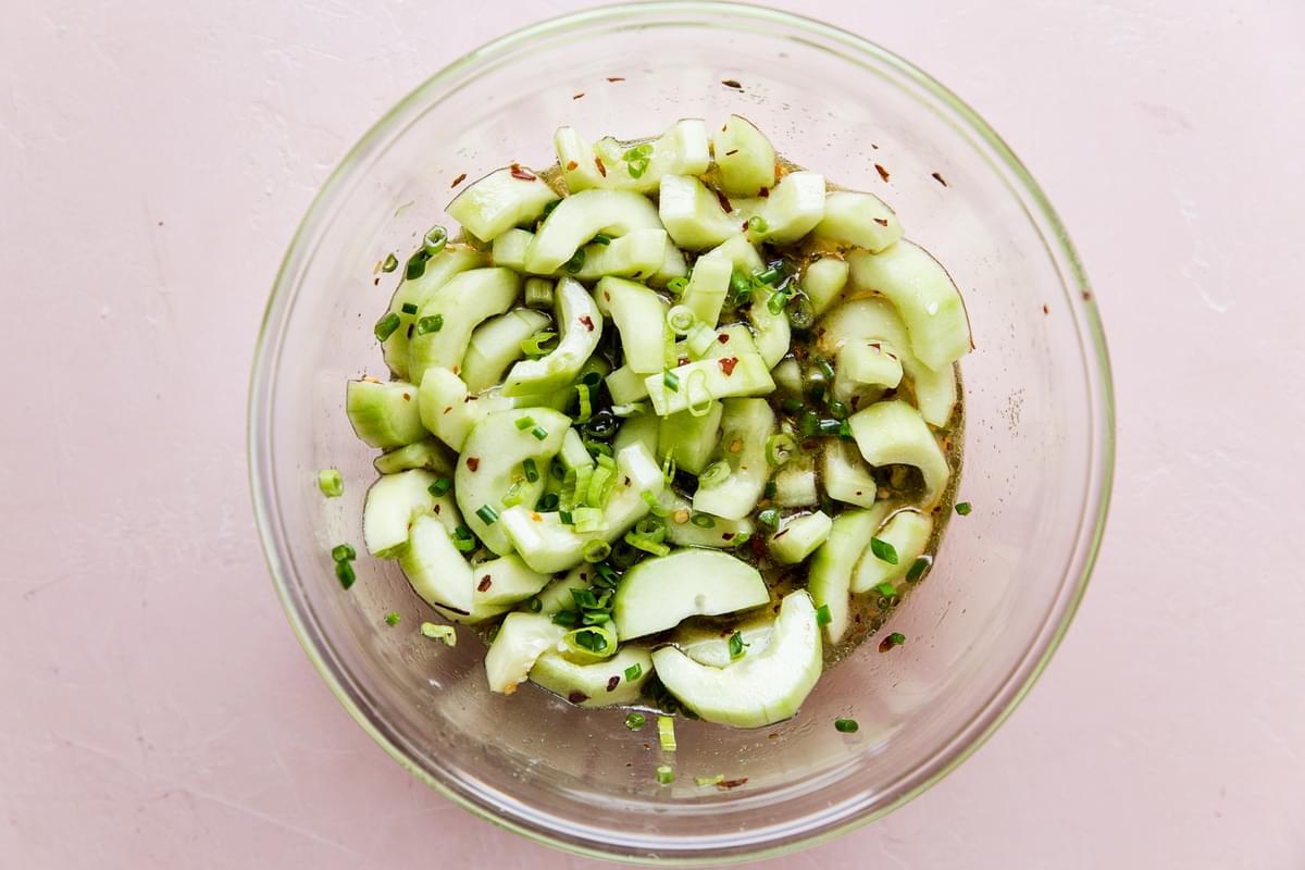 asian cucumber salad in a large glass bowl