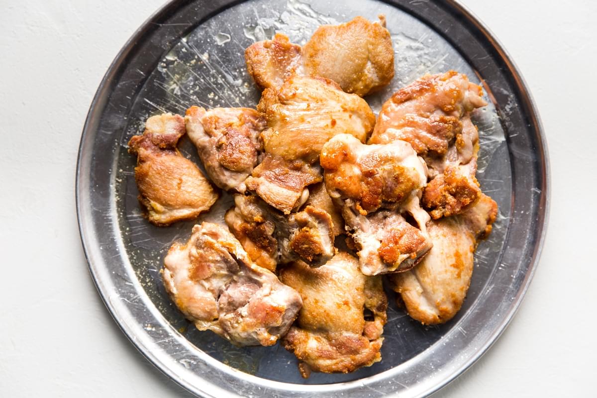 Boneless Skinless Crispy Chicken Thighs on a plate