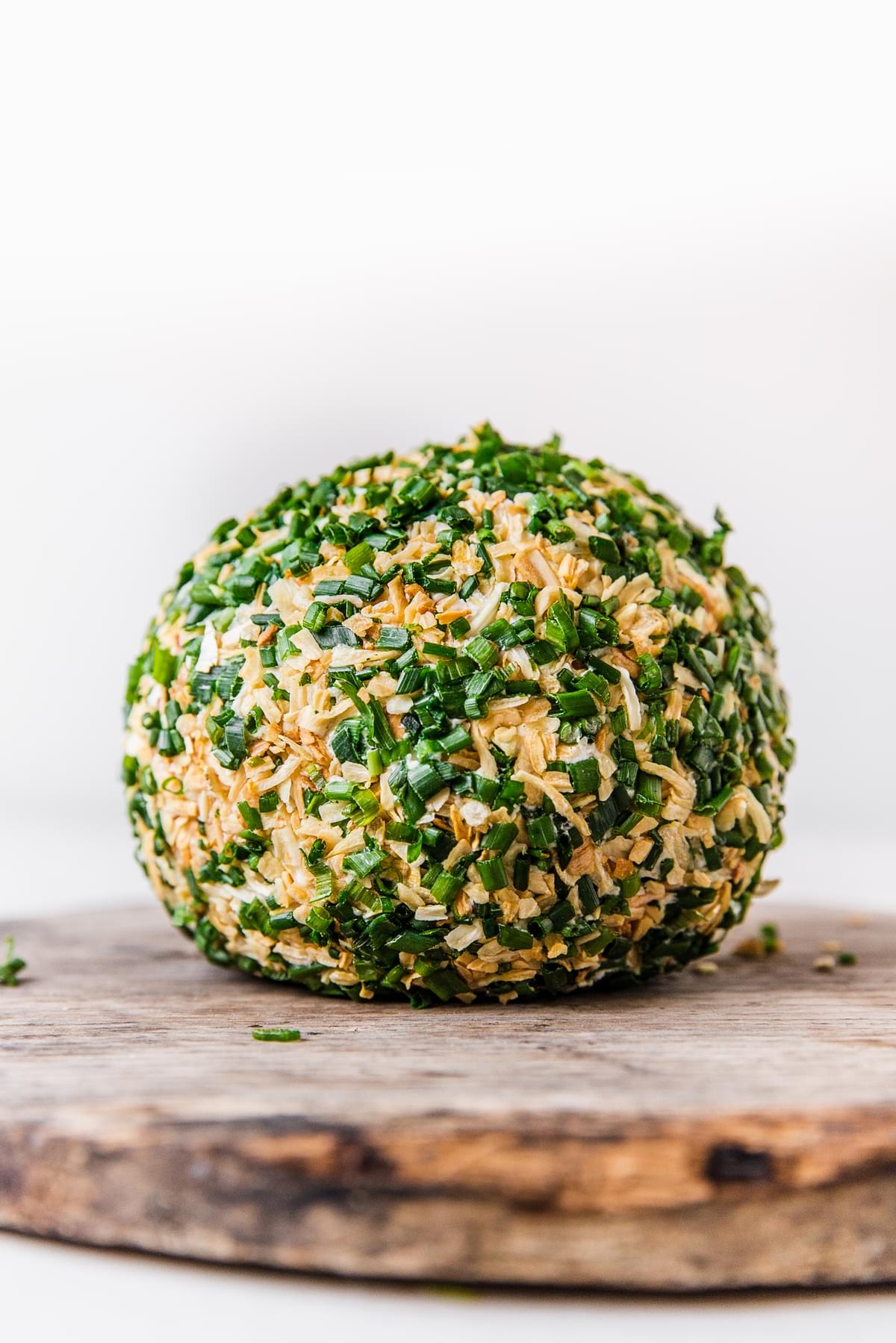 Cheddar And Onion Cheeseball on a plate