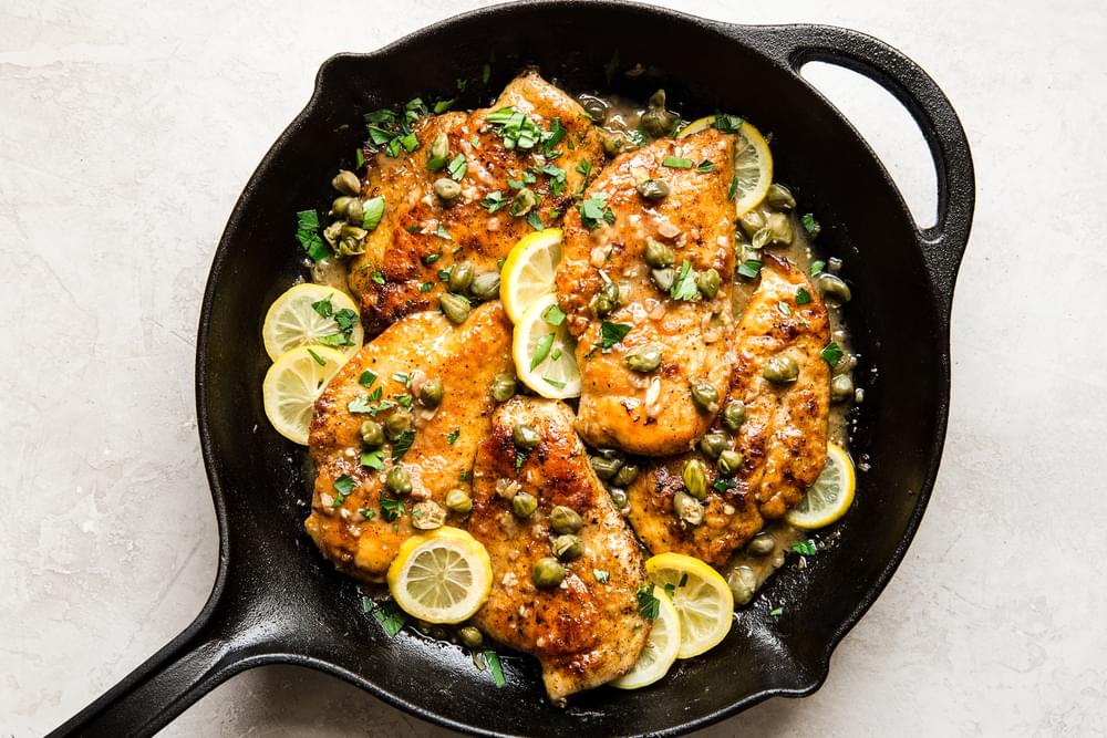 lemon Chicken Picatta recipe finished in a cast iron skillet