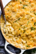 Baked Macaroni And Cheese with panko crust and serving spoon