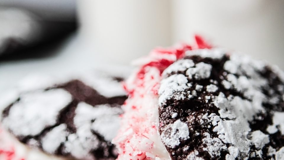 chocolate Crinkle Cookies With Peppermint Cream and candy cane pieces