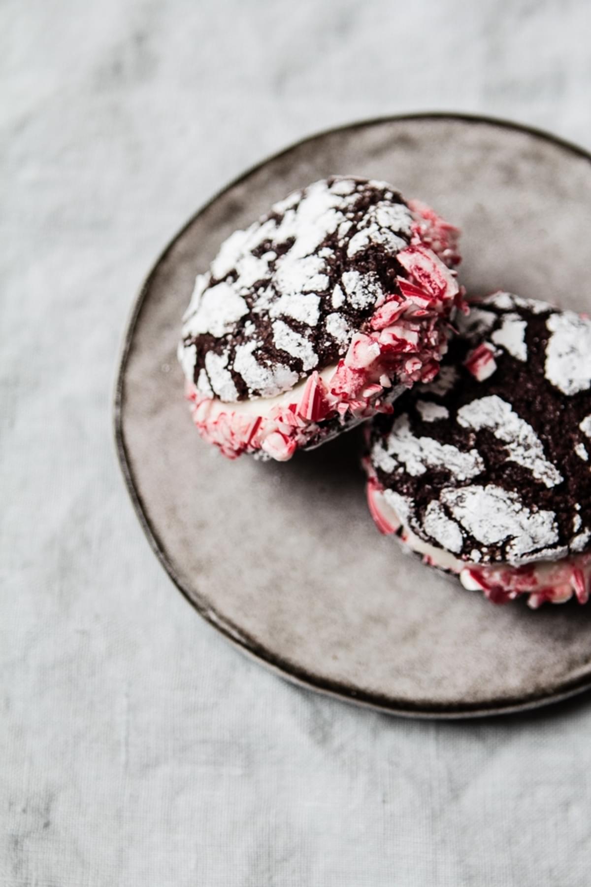 Crinkle Cookies With Peppermint Cream and crushed candy cane on a plate