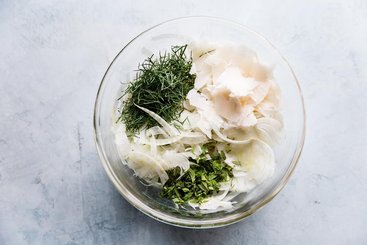 prepped ingredients for shaved fennel salad in a bowl