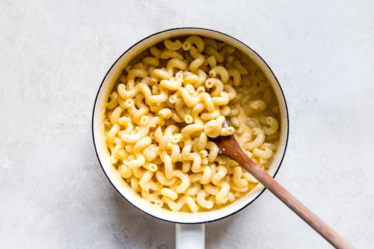 four ingredient stovetop mac and cheese in a white enamel saucepan