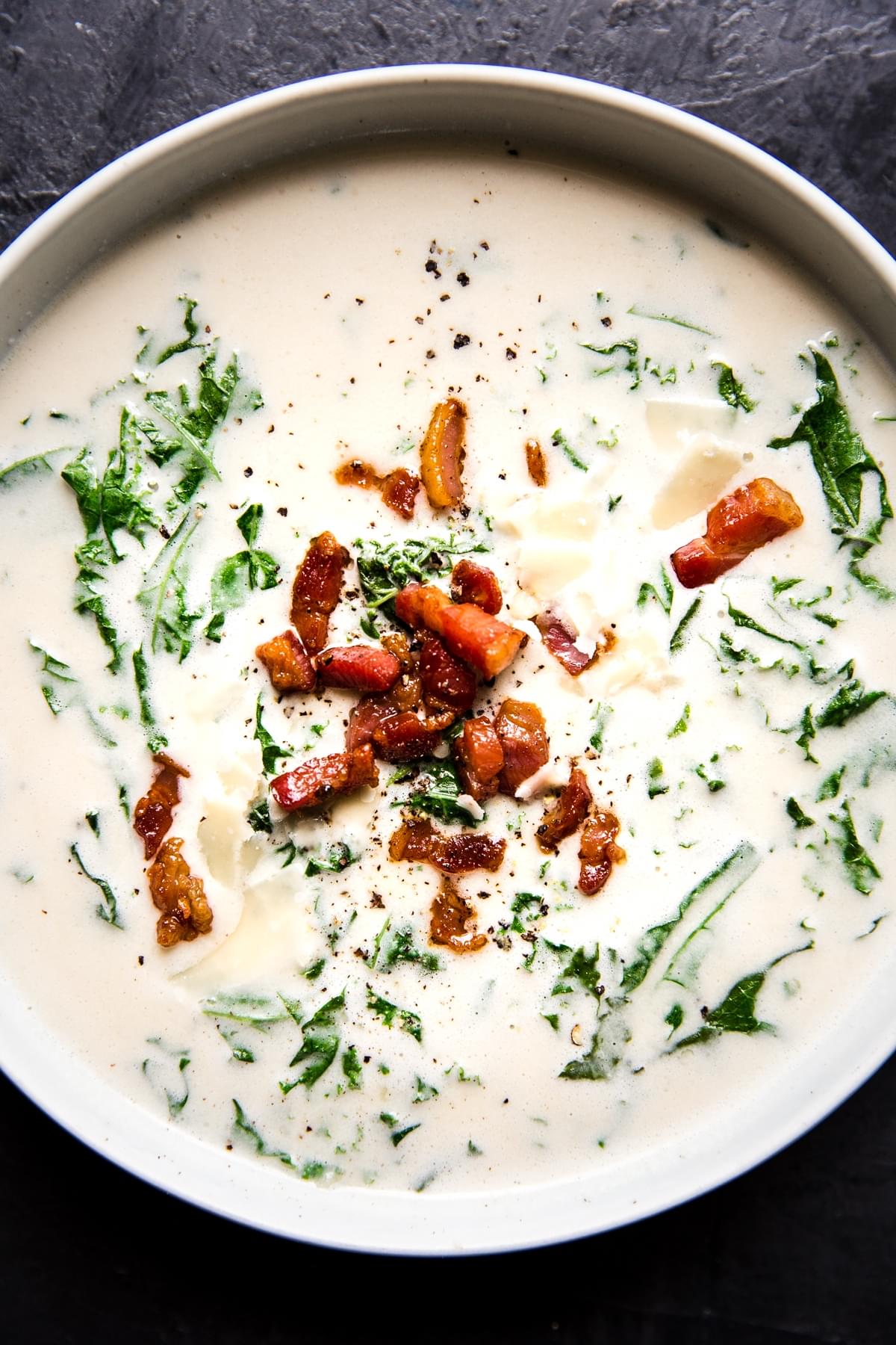 garlic soup topped with crispy pancetta