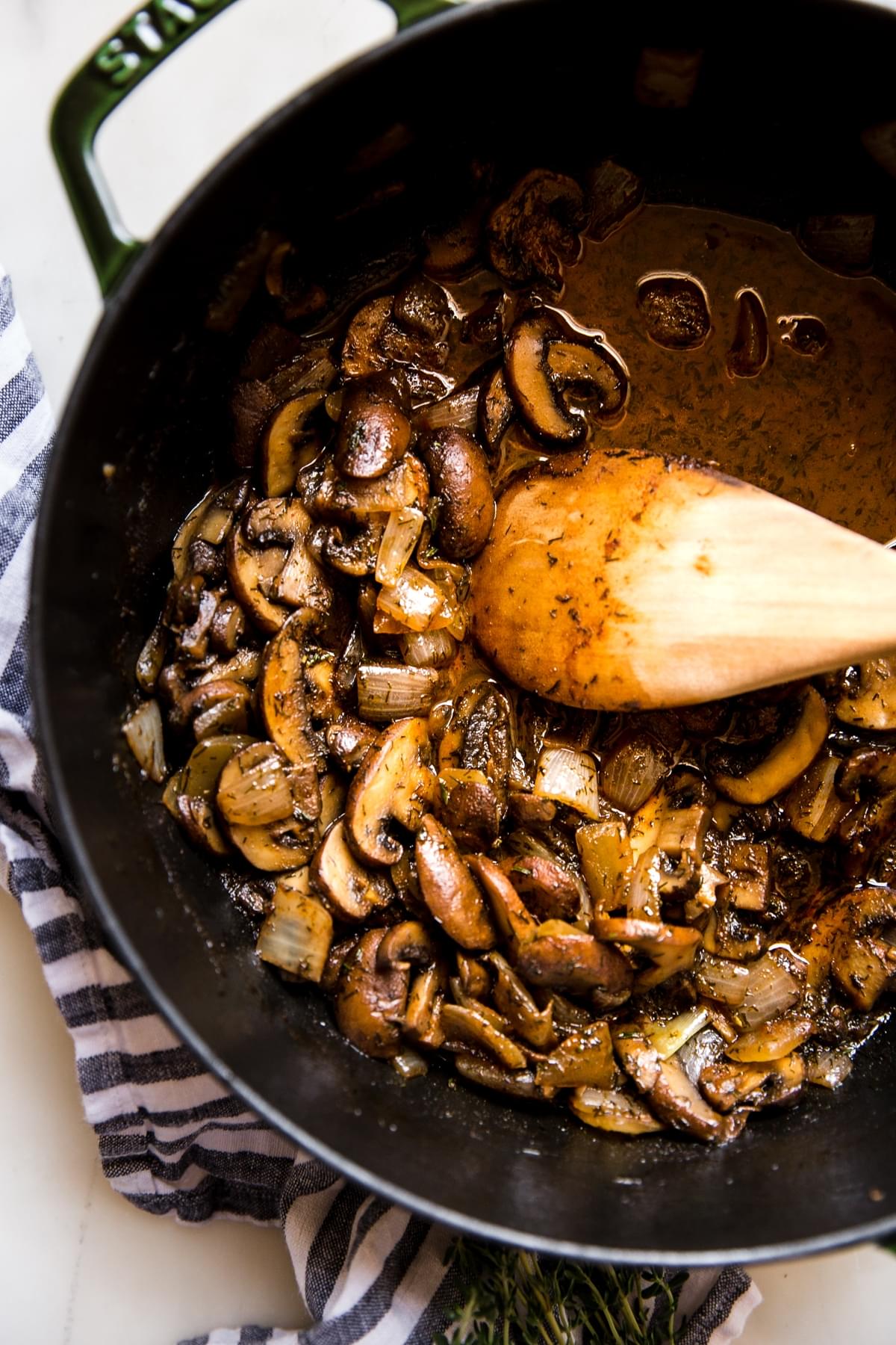 large pot of mushrooms sautéed with butter and onions
