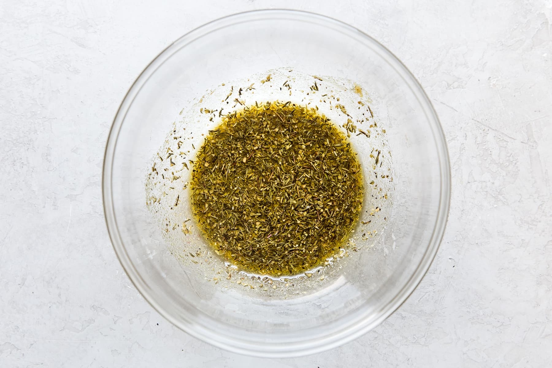 spices in a bowl with olive oil