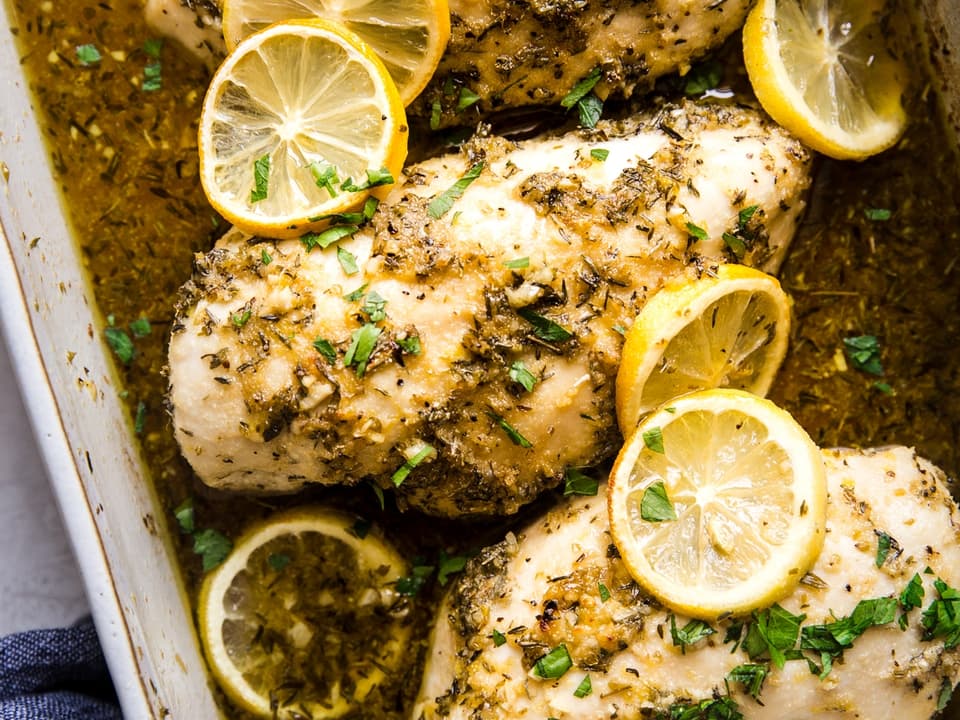 Lemon Chicken breasts baked in a baking dish