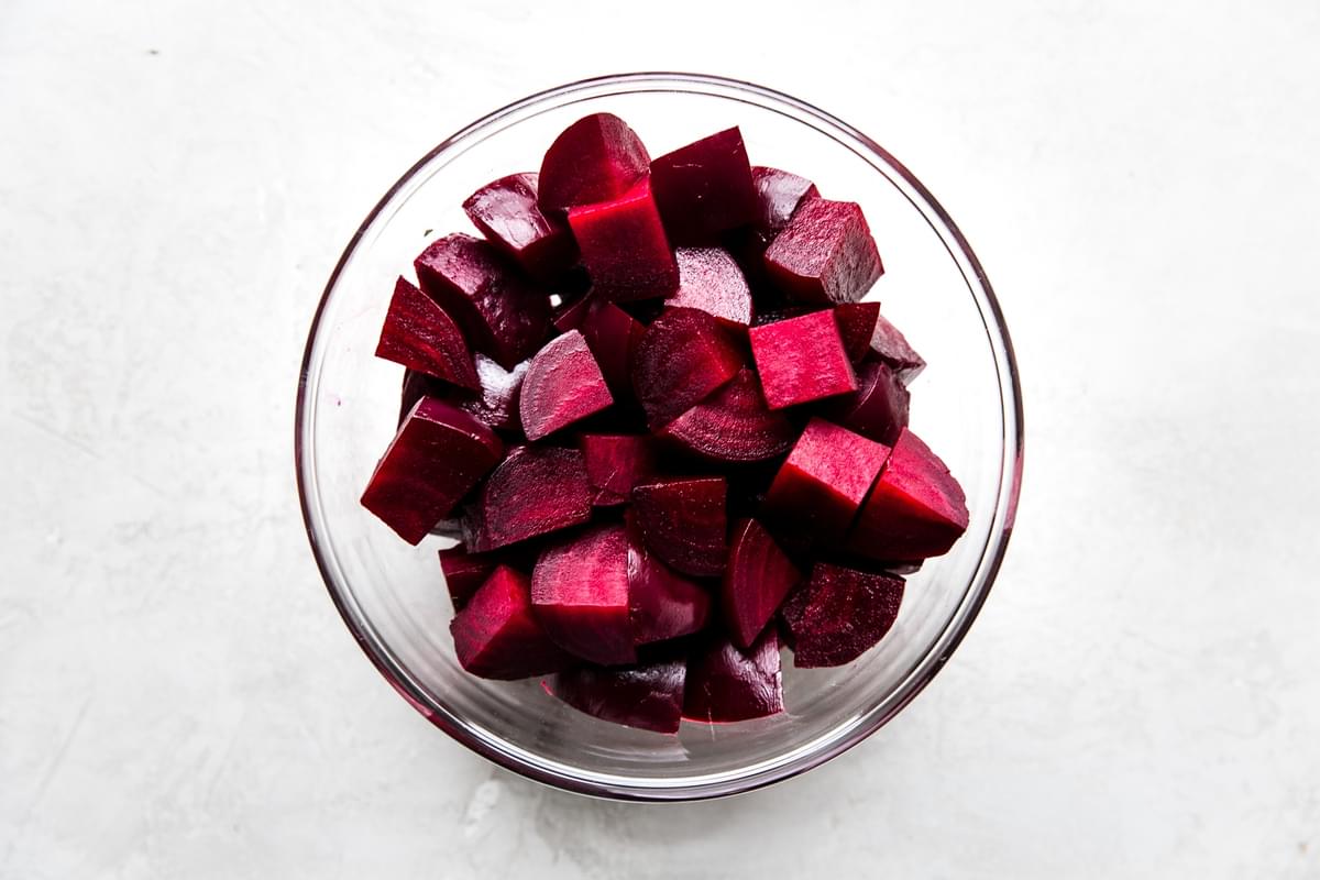 cooked red beets cubed and in a large glass bowl