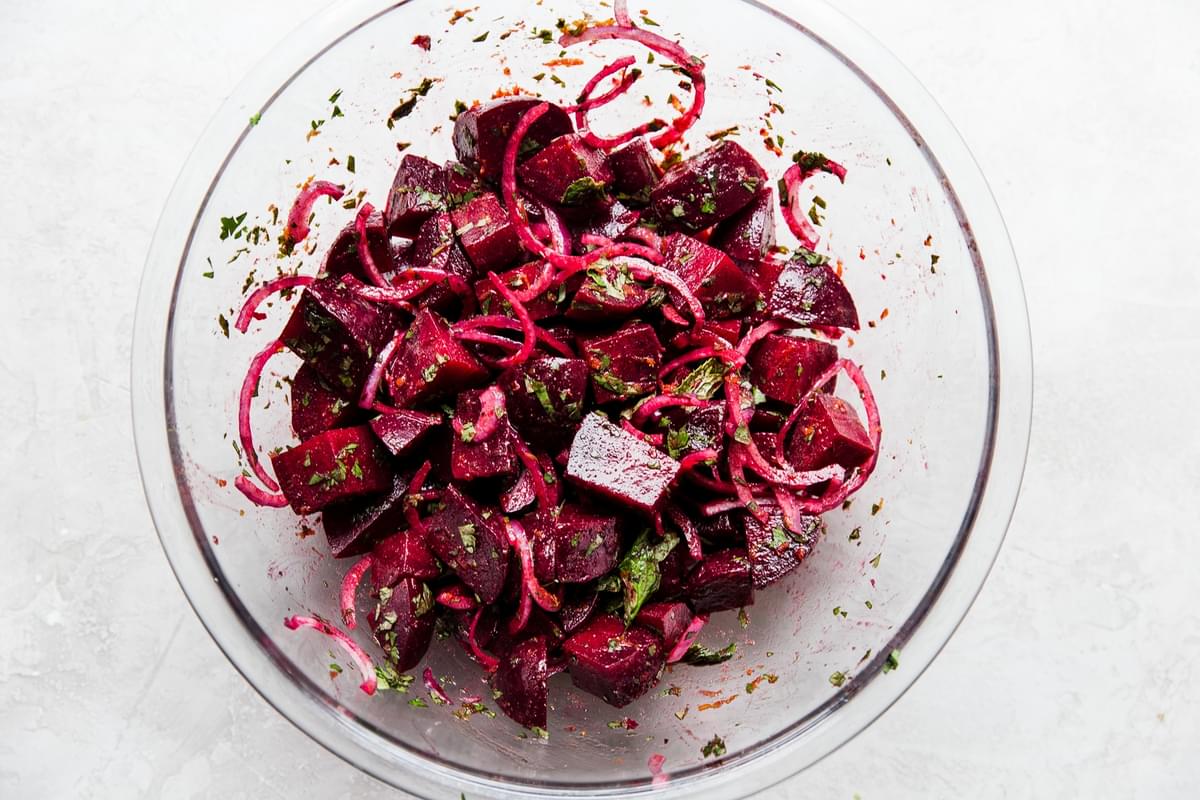 moroccan beet salad in a large glass bowl