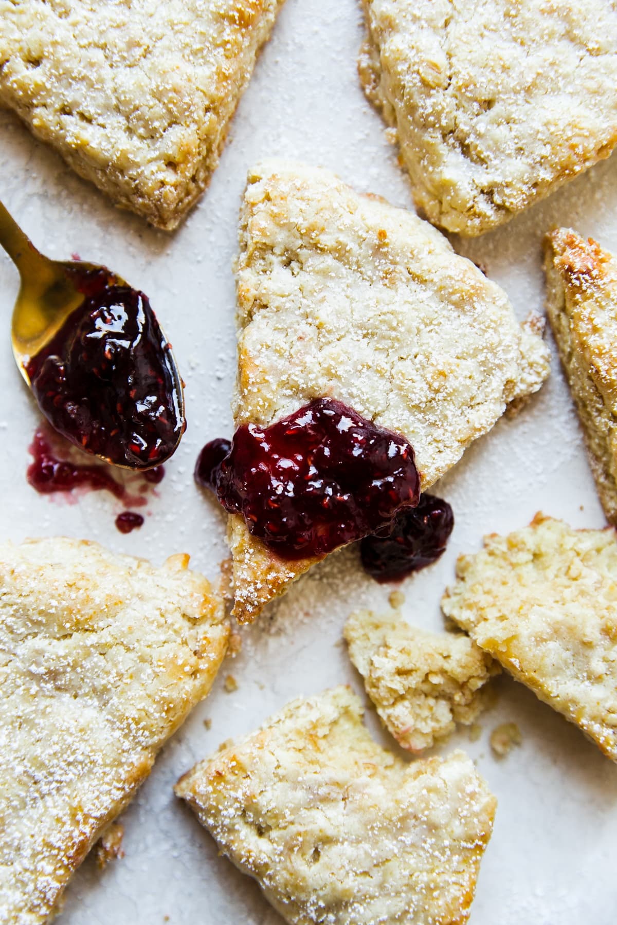 oat scones topped with raspberry jam